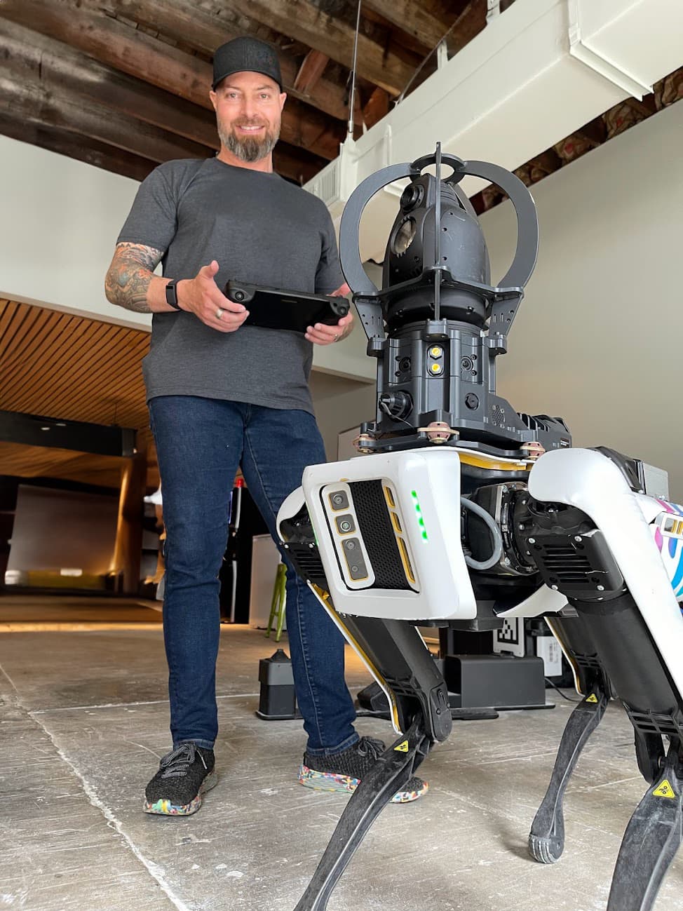 Johann Beukes with Boston Dynamics SPOT robot - first production deployment for analytics